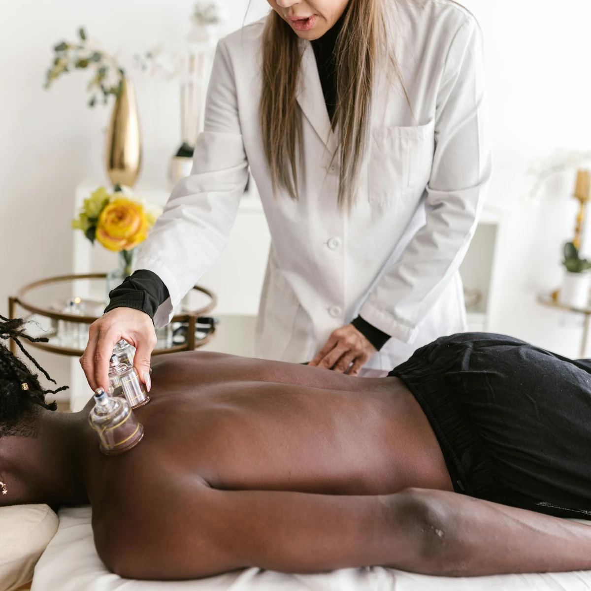 Cupping therapy used as one of the available add-ons for tailored appointments.