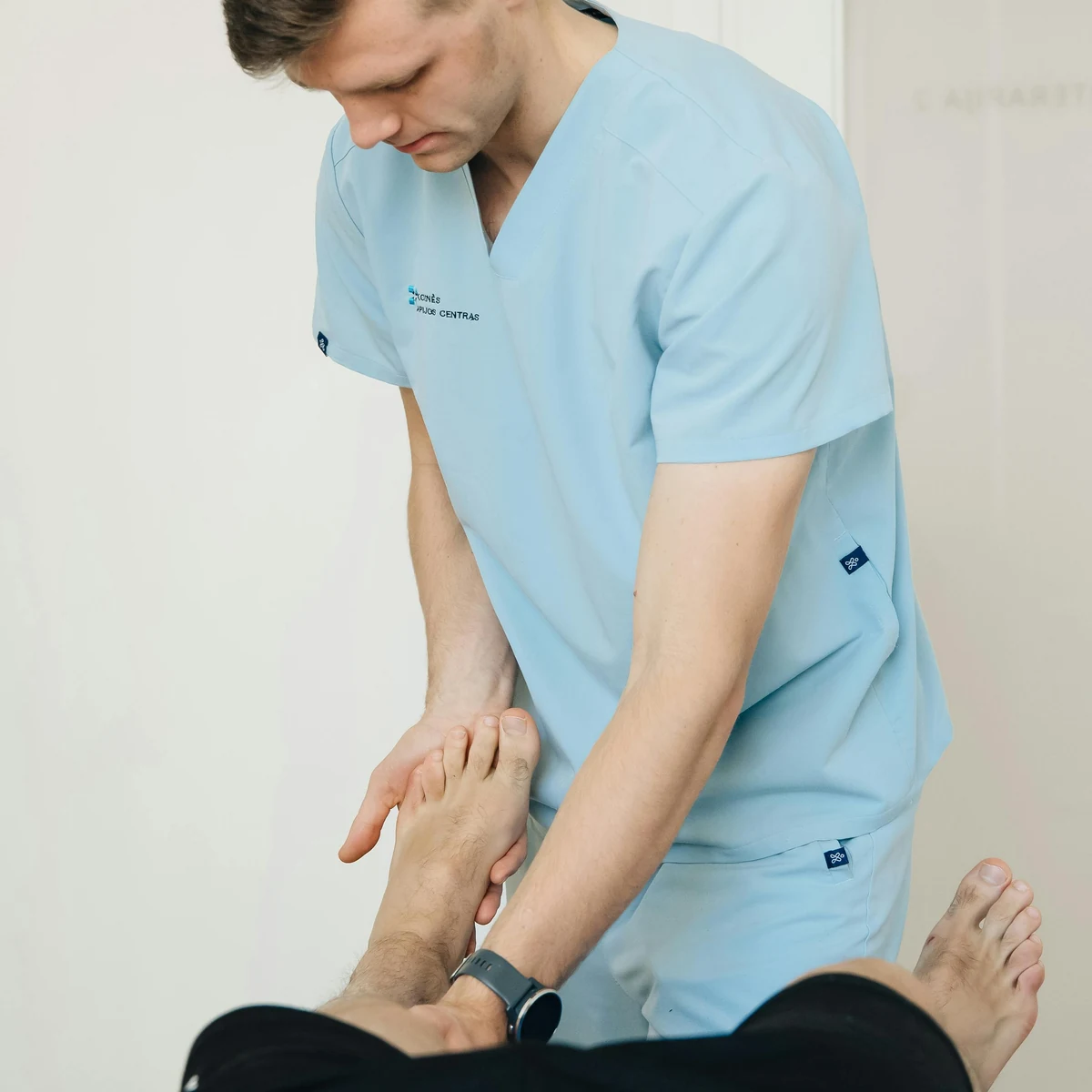 Reflexology treatment focused on the feet during a calmer restorative appointment.